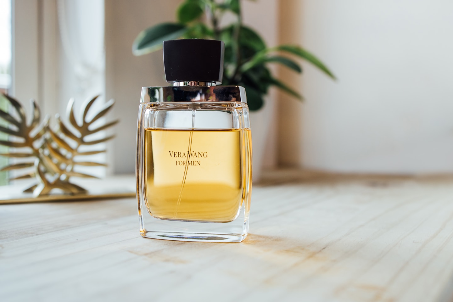 Perfume on natural desk. Indoor light.